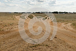 Crossroads of rural roads in a field