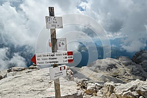 Crossroads on top of Piz Boe peak in Italian Dolomites