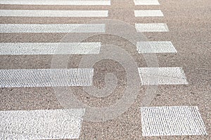 Crosswalk on the asphalt road. Zebra crossing