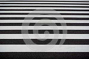 Crosswalk in Black and white on the asphalt road. Pedestrian on