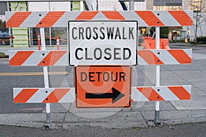 Crosswalk closed and detour signs