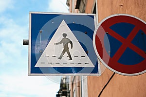 Crosswalk or sign for drivers. Sign or symbol parking is forbidden also restriction of speed. Concede movement for