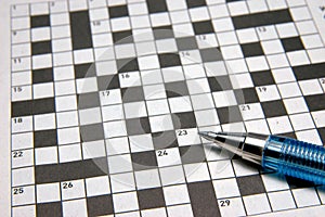 Crossword puzzle & pen