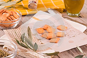 Crostini bread with oregano and olive oil.