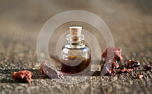 Croton lechleri, or sangre de drago oil in a bottle photo