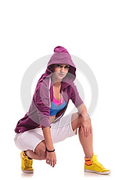 Crouched hip hop woman dancer