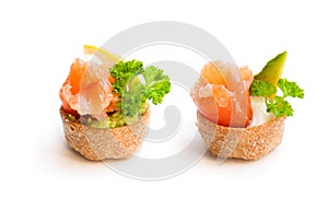 Croustades crispy pastry cases filled with salted salmon and av