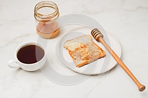 Croutons for breakfast with honey and coffee