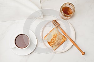 Croutons for breakfast with honey and coffee