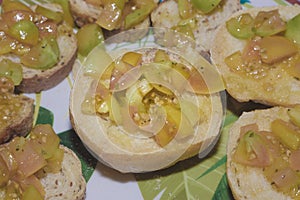 Croutons of cherry tomatoes on a plate.