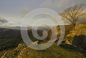 Crow Castle During Sunrise as first light hits the hill sides