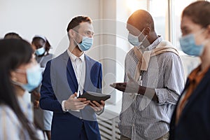 Crowd of Business People Wearing Masks