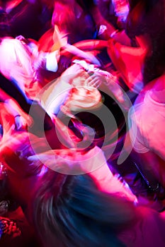 Crowd dancing in the nightclub