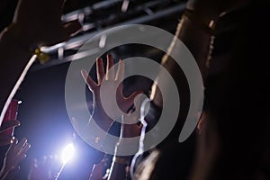 Crowd dancing at a rock concert