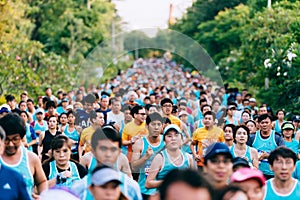 Crowd and diversity of people, men and women in the morning are running mini, half and full marathon in the park