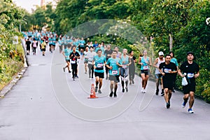 Crowd and diversity of people, men and women in the morning are running mini, half and full marathon in the park