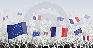 Crowd with flag of European Union and France, people of France with flag of EU