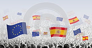 Crowd with flag of European Union and Spain, people of Spain with flag of EU