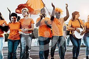 Crowd football fans walking to stadium for watching soccer game