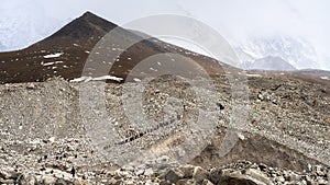 Crowd of hikers walking towards Everest base camp, Nepal