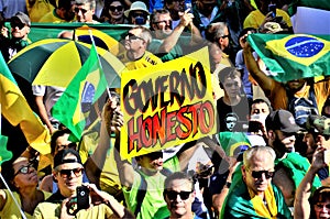 In the crowd, a man holds the sign: `Honest Government` at the demonstration in favor of President Bolsonaro
