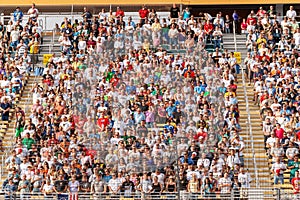 Crowd at Miami Homestead motor speedway standing for The Star-Spangled Banner