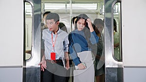 Crowd of people on a busy crowded public subway train travel