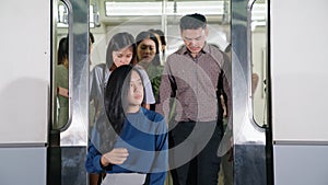 Crowd of people on a busy crowded public subway train travel