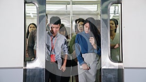 Crowd of people on a busy crowded public subway train travel