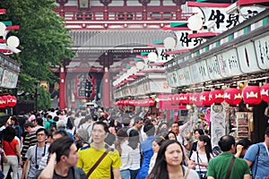 Crowd of people in Nakamise Dori street for shopping and visiting nearby temples, Tokyo, Asakusa, Japan