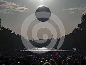 Crowd of people watching solar eclipse