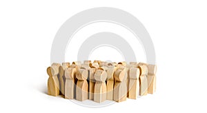 A crowd of people on a white background. Many wooden figures of people. The concept of gregarious feelings, the segmentation