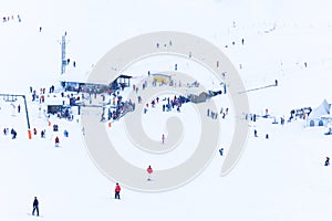 A Crowd of Skiers on an Alpine Slope