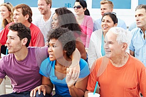 Crowd Of Spectators Watching Outdoor Sports Event