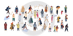 Crowd of tiny people dressed in autumn clothes or outerwear walking on street and performing outdoor activities. Group