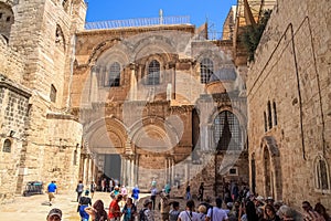 Crowd of tourists gather at the Church of the Holy Sepulcher in old meets new scene