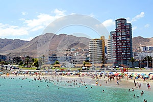 Crowded beach in Antofagasta, Chile, as seen from the sea.