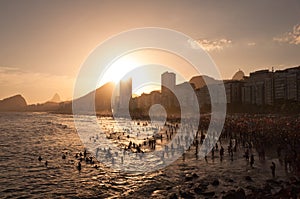 Crowded Copacabana Beach by Sunset in Rio de Janeiro, Brazil