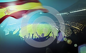 Crowded football stadium with spanish flag
