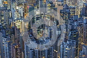 Crowded high rise building in Hong Kong city at night