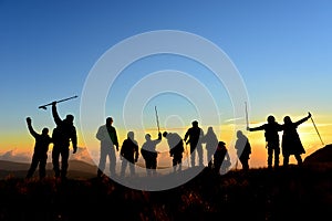 Crowded hiking group and peak success