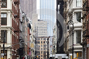 Crowded old buildings at the intersection of Broome and Greene Streets in SoHo New York City