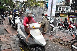 Crowded scooter traffic in Hanoi, Vietnam