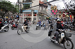 Crowded scooter traffic in Hanoi, Vietnam