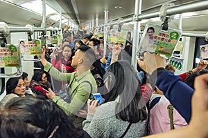 Crowded subway train carriage, Shanghai China