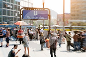 Crowds of people in motion blur - Alexanderplatz in Berlin city