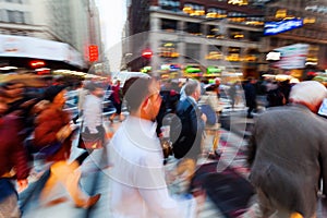 Crowds of people on the move on Broadway, Manhattan, New York City