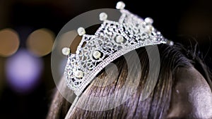 Crown beauty queen sparkles luxury close up symbol female dream fashion show 4K.
