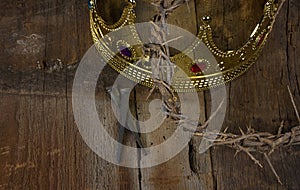 Crown of thorns and gold crown with nails