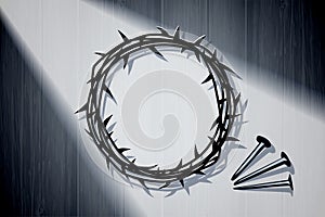 Crown of thorns with nails on wooden background for Good Friday